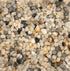 Close-up of small pearl pebbles with various colors including white, gray, and  pops of orange.